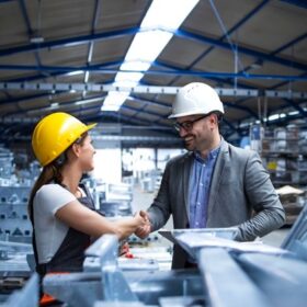 factory-manager-visiting-production-line-congratulating-worker-promotion-hard-work-good-results_342744-117