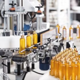 transparent-plastic-bottles-filled-with-yellow-substance_273609-13375