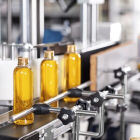 transparent-plastic-bottles-filled-with-yellow-substance_273609-13376